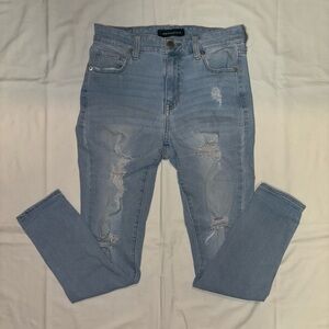 Ripped light blue skinny jeans